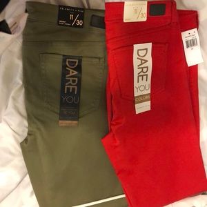 Pair of red and a pair of green jeans